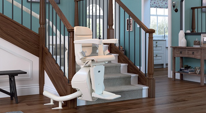 Curved stairlift on staircase with turns